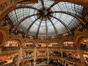 a large building with a domed glass ceiling