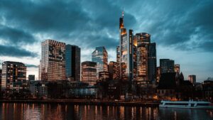 Modern city skyline with skyscrapers at dusk